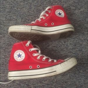 Red converse high tops